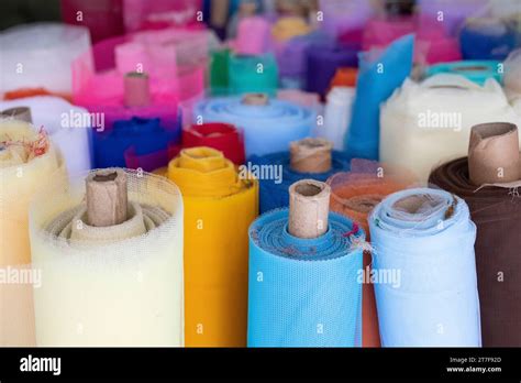 coloured fabric rolls stock photo alamy
