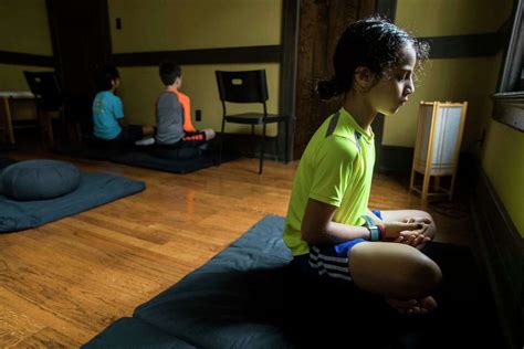 Mindfulness for third-graders? Meditation, yoga help kids ward off ...