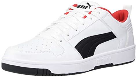 Reach New Heights Of Performance With Puma Rebound Black And White Shoes