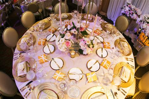 Gold And Ivory Wedding Reception Table Decor With Gold Chargers Gold