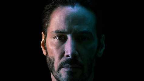 Keanu Reeves as John Wick 2560x1440 HDTV Wallpaper