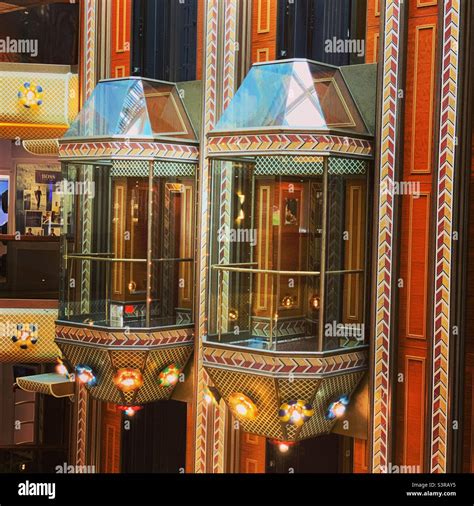 March 2022 Glass Elevators In The Atrium Of Carnival Conquest Cruise