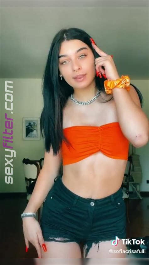 Hot Sofia Crisafulli Shows Cleavage In Orange Tube Top Sexyfilter