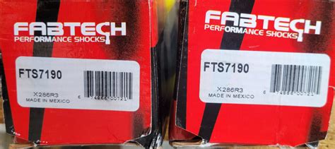 FRONT PAIR Fabtech FTS7190 Performance Twin Tube Shock Absorbers EBay