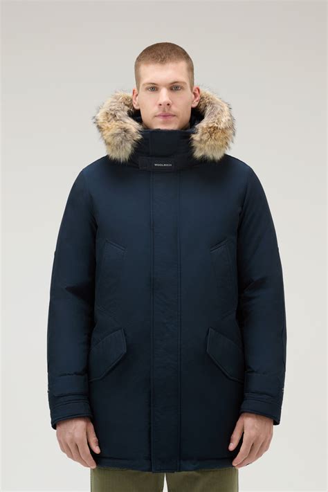 Men S Polar Parka In Ramar Cloth With High Collar And Fur Trim Blue Woolrich Us