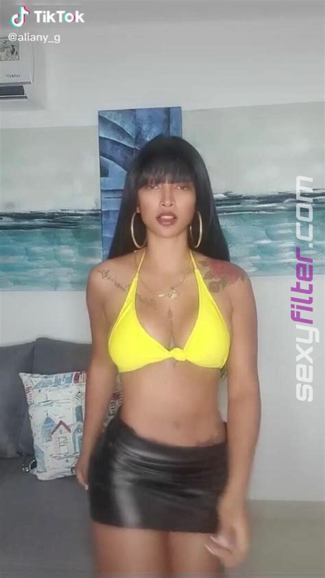 Sexy Aliany García Shows Cleavage in Yellow Bikini Top sexyfilter