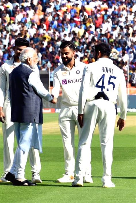 Prime Minister Narendra Modi With Indian Cricketer Virat Kohli And Team Captain Rohit Sharma