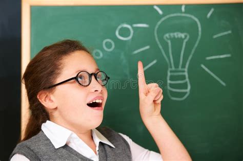 Girl Thinking And Light Bulb On Chalkboard For Solution Ideas And Wow