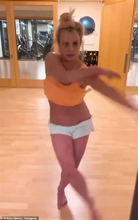 Britney Spears Rocks Very Low Rise Short Shorts And A Skimpy Orange Crop Top In Latest Dancing