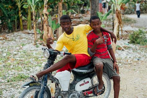 Two Boys Riding A Motorcycle · Free Stock Photo