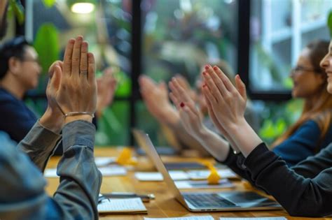 Premium Photo Business People Clapping Hands During Meeting In Office