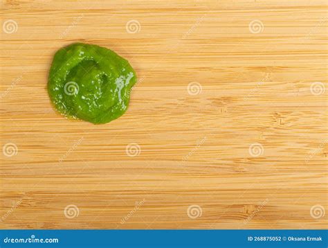 Wasabi Smear Isolated Green Sushi Paste On Wood Background Stock Photo