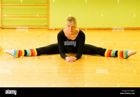 Ballet Dancer Doing Stretching Exercise On A Floor Stock Photo Alamy