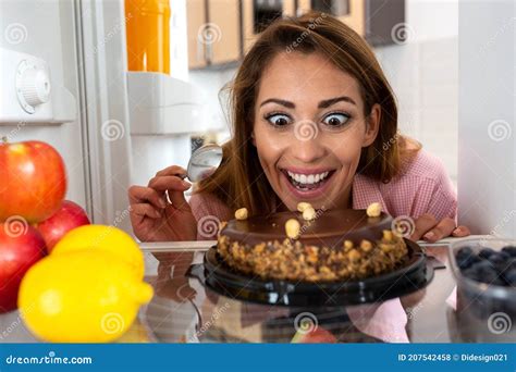 Mmmmm Yummy Cake In Front Of A Young Womanâ€™s Face Catching Her Eyes