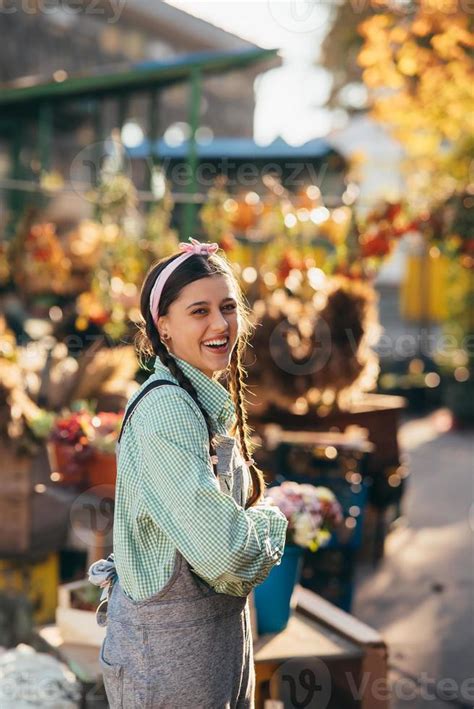 Happy farmer woman in denim overalls smiling sincerely while posing. 15497465 Stock Photo at ...