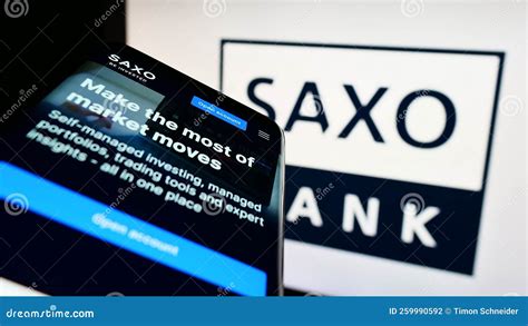 Mobile Phone With Website Of Danish Investment Banking Company Saxo