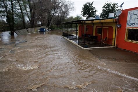 Atmospheric river storm brings headaches, traffic jams and wet weather ...