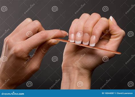 Female filing nails stock image. Image of filing, cosmetics - 10044087