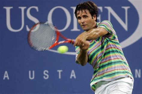 fabrice santoro two handed forehand at contact.jpg