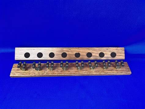 Wall Mounted Cue Rack – Queensland Walnut | Old Mates Mancave