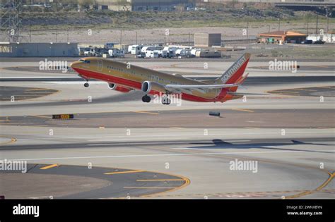 Southwest Airlines Desert Gold Retro livery at PHX taking off Stock ...