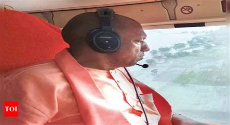 Yogi Adityanath Up Cm Yogi Adityanath Conducts Aerial Survey Of Flood