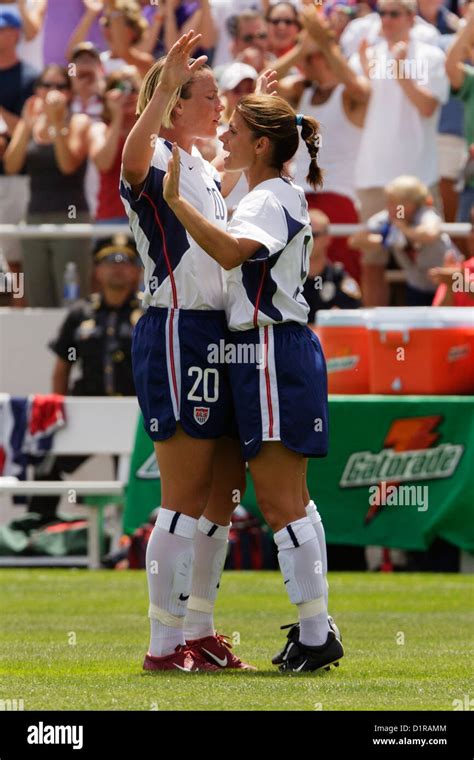 Abby Wambach L And Mia Hamm R Of The United States Celebrate Hamms