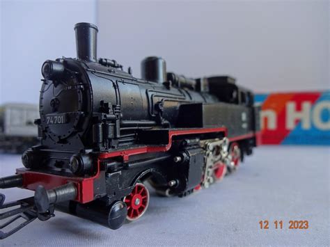 Märklin H0 3095 Güterwagen Tenderlokomotive BR 74 mit 5