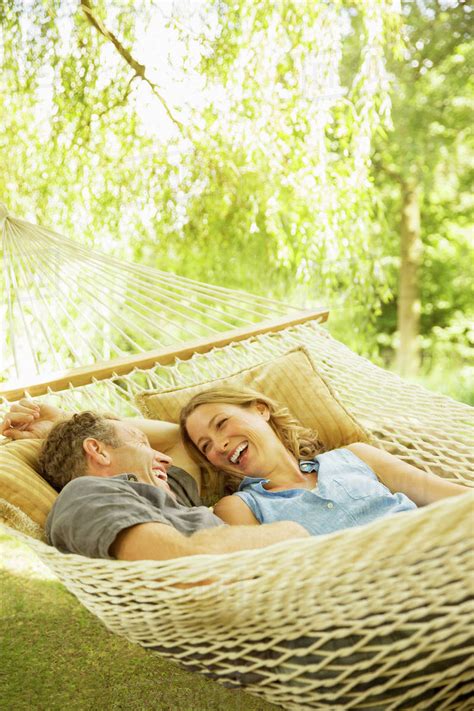 Couple Relaxing In Hammock Outdoors Stock Photo Dissolve