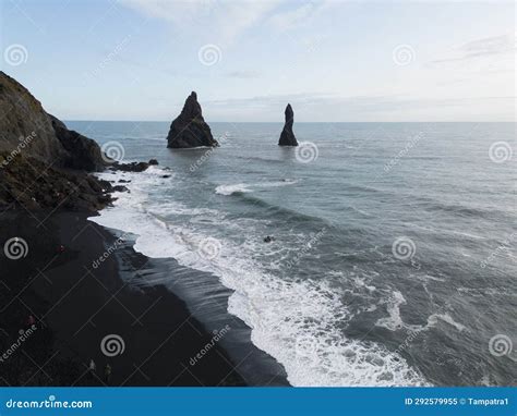 Aerial Top View Of Wave Of Black Sand Beach Reynisfjara In Iceland