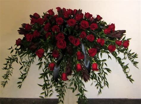 Red rose casket spray in Atlanta, GA | Flowering Events