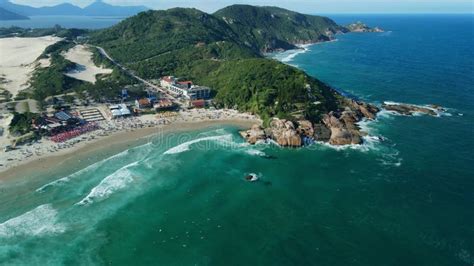 Joaquina Beach With Mountains Rocks And Ocean With Waves In Brazil