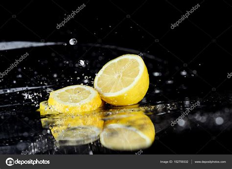 Sliced lemon with water drops — Stock Photo © alebloshka #152759332