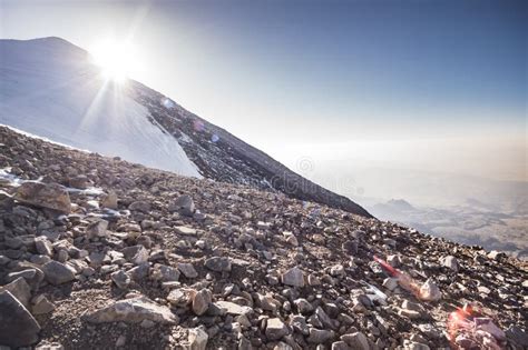 Climbing To The Top Of Mount Ararat Covered With Snow And Glaciers Over