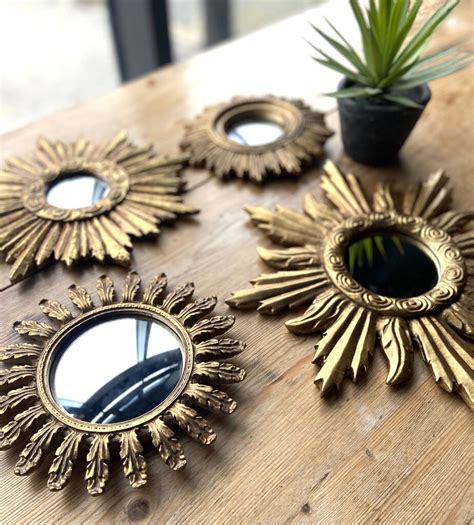 A Choice Of Burnished Gold Sunburst Mirrors By The Forest Co