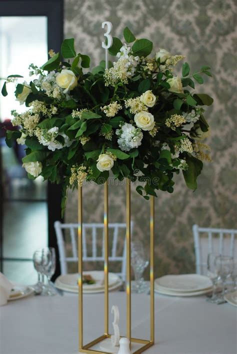 Beautiful White And Green Flower Decoration Arrangement On Wedding