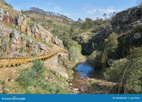 Penedo Furado Passadico Walkway Landscape In Vila De Rei Portugal