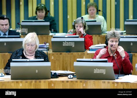 Senedd Welsh Assembly Debating Chamber AMs Sit In Front Of Their