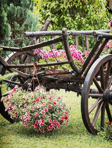 Wooden cart with summer flowers, detail scene ⬇ Stock Photo, Image by © Vrabelpeter1 #98089116