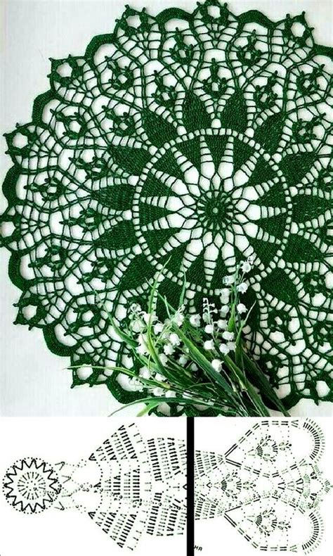 Crocheted Doily With Green Leaves And White Flowers In The Center Next