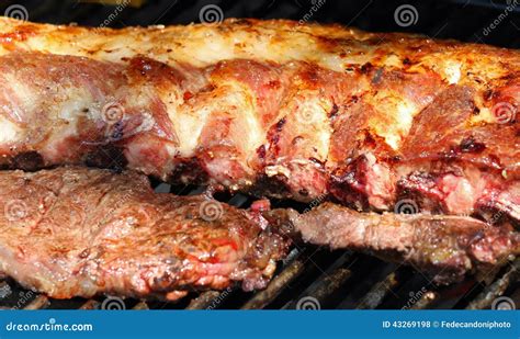 Giant Grilled Pork Chops With Barbecue In The Garden 4 Stock Photo