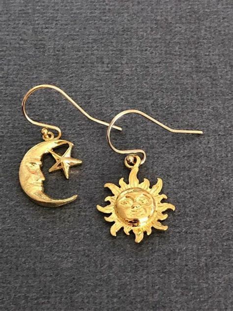 Pin By M A D D I E On A C C E S S O R I E S Moon Face Earrings Moon