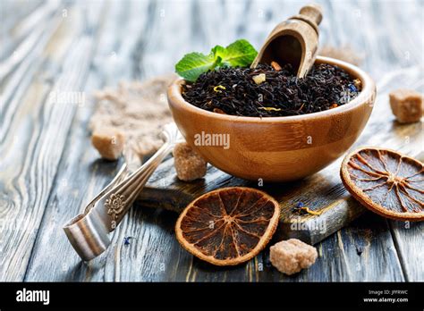 Black tea with bergamot and flower petals Stock Photo - Alamy