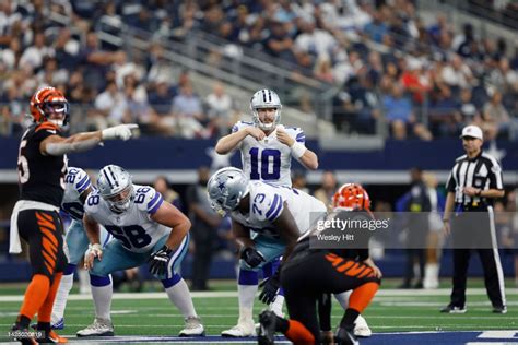 Cooper Rush Of The Dallas Cowboys Signals To His Team Before The Snap