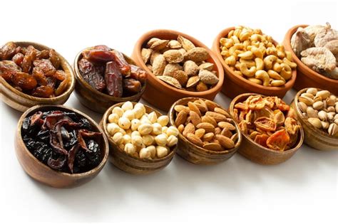 Premium Photo Dried Fruits And Mixed Nuts Healthy Foods