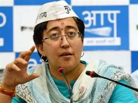 Education Minister Atishi picture on MCD school books BJP protests ...