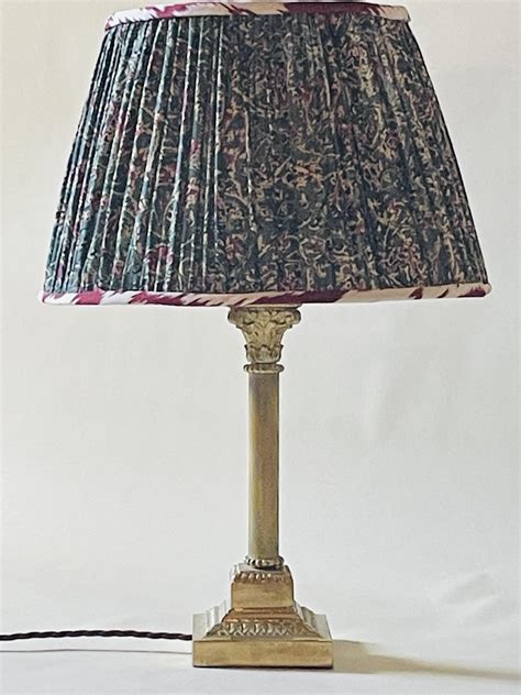 A Small Corinthian Brass Column Lamp Miranda Willes