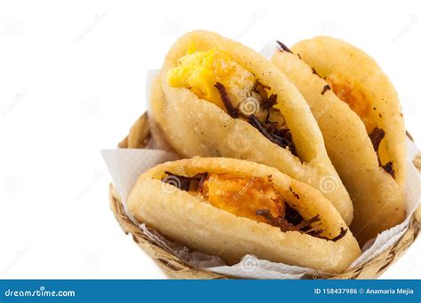 Arepa De Huevo. Traditional Colombian Fried Arepa Filled With Egg And ...