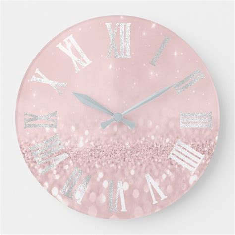 A Pink Wall Clock With Silver Numbers And Glitters On The Face Is