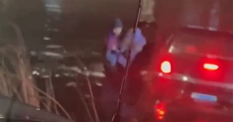 Man Jumps Into Freezing Pond To Save Two Women Stuck In Their Car